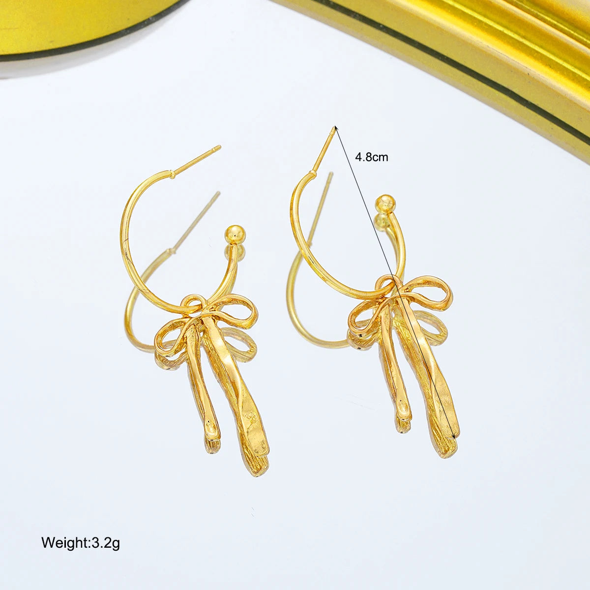 Lumière Gold Bowknot Tassel Drop Earrings | Vintage Statement Jewellery - Wahtrends