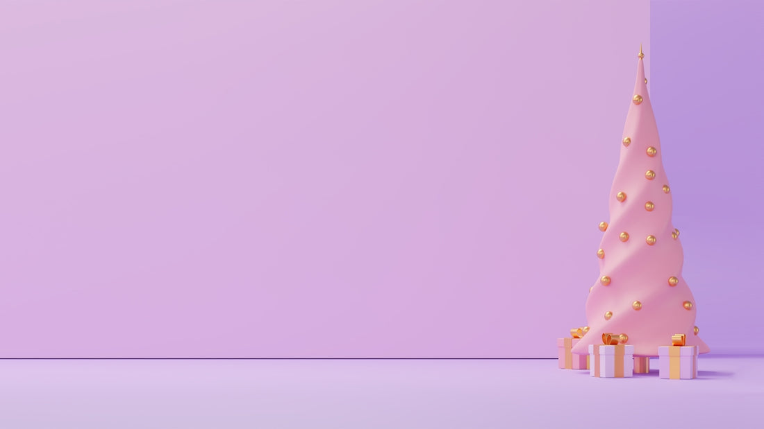 a pink and gold christmas tree on a purple background