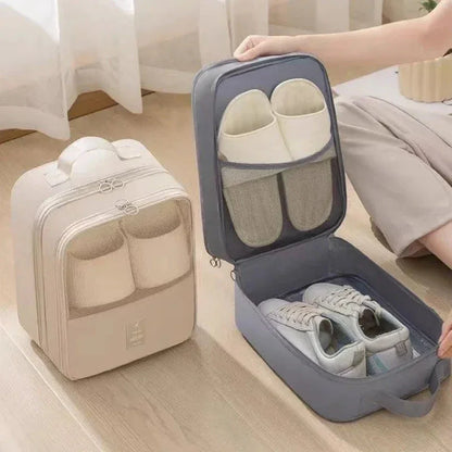 Beige and gray shoe bags with compartments holding slippers and sneakers on wooden floor