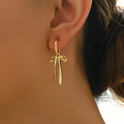 Lumière Gold Bowknot Tassel Drop Earrings | Vintage Statement Jewellery - Wahtrends
