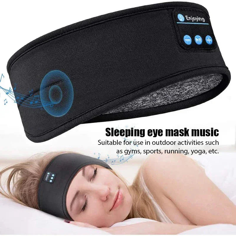 Black wireless sleeping eye mask with built-in music speakers, shown worn by a sleeping woman