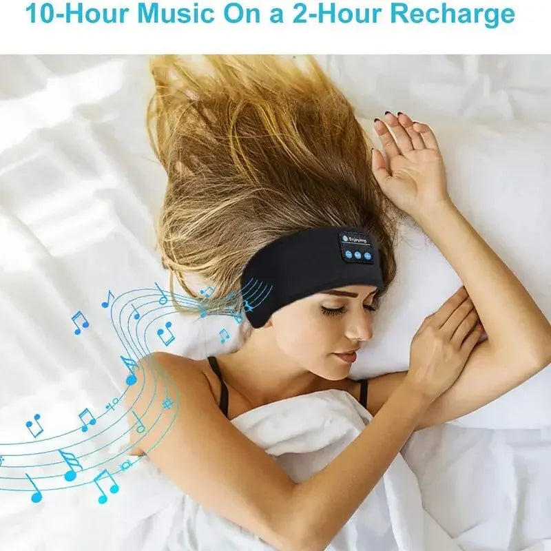 Woman sleeping in bed wearing black Bluetooth music headband with 10-hour playback and 2-hour recharge