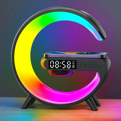 Modern alarm clock with digital display and rainbow LED light ring holding a smartphone