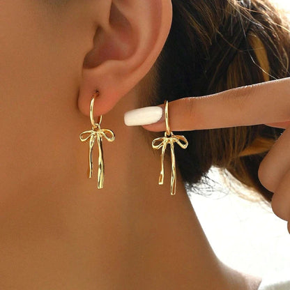 Lumière Gold Bowknot Tassel Drop Earrings | Vintage Statement Jewellery - Wahtrends