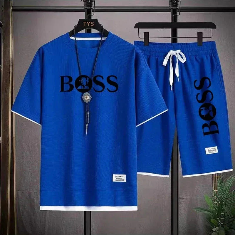 Blue casual t-shirt and shorts set with BOSS print, white trim, and black pendant necklace