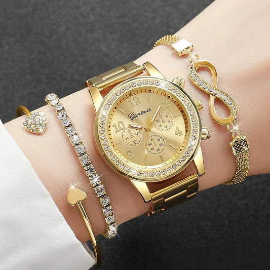 Gold Geneva wristwatch with crystal accents paired with three gold and crystal bracelets on a wrist