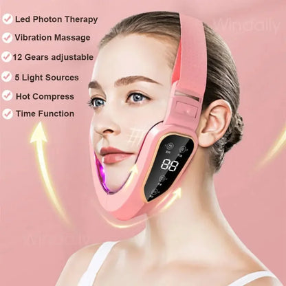 Woman wearing pink LED photon therapy face slimming mask with vibration massage and hot compress features