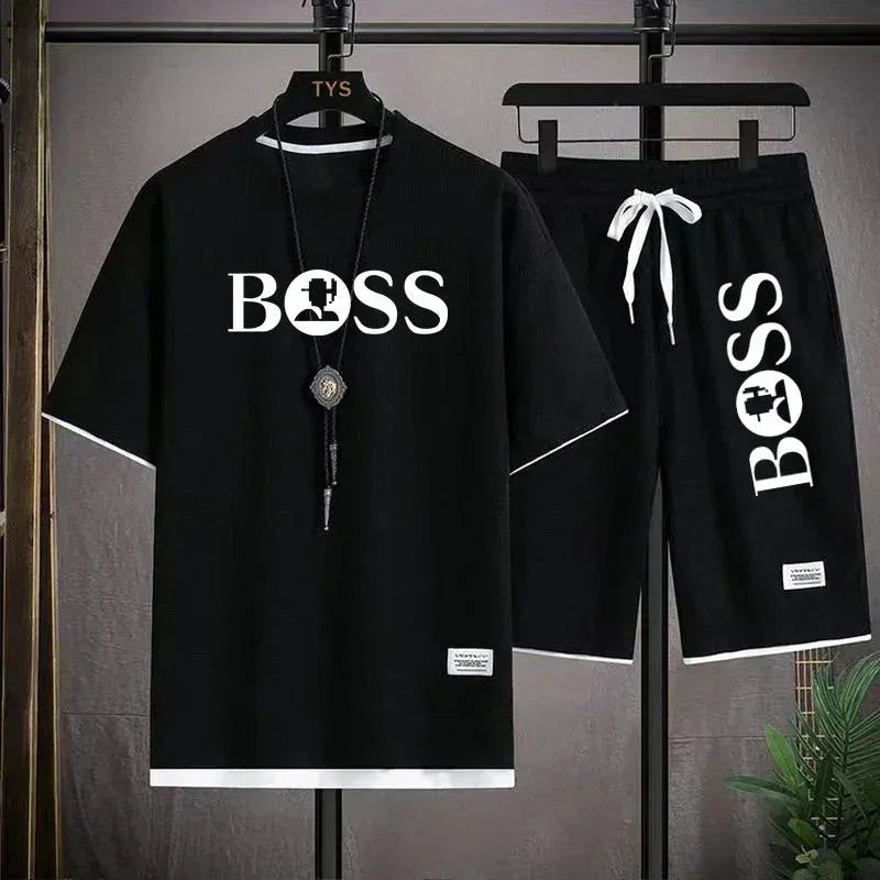 Black casual outfit with white BOSS logo, short sleeve shirt and drawstring shorts set